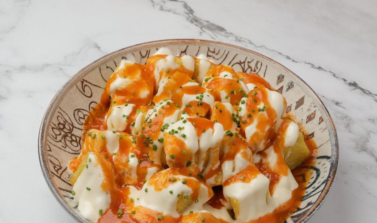 Racion de bravas de Kaxopo Adictos