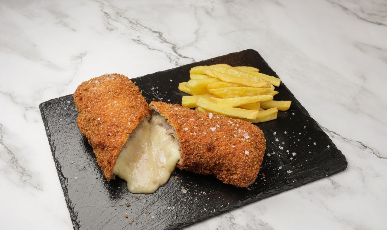 El Adicto cortado con relleno fundido