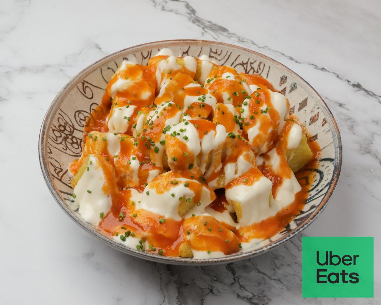 Racion de bravas de Kaxopo Adictos